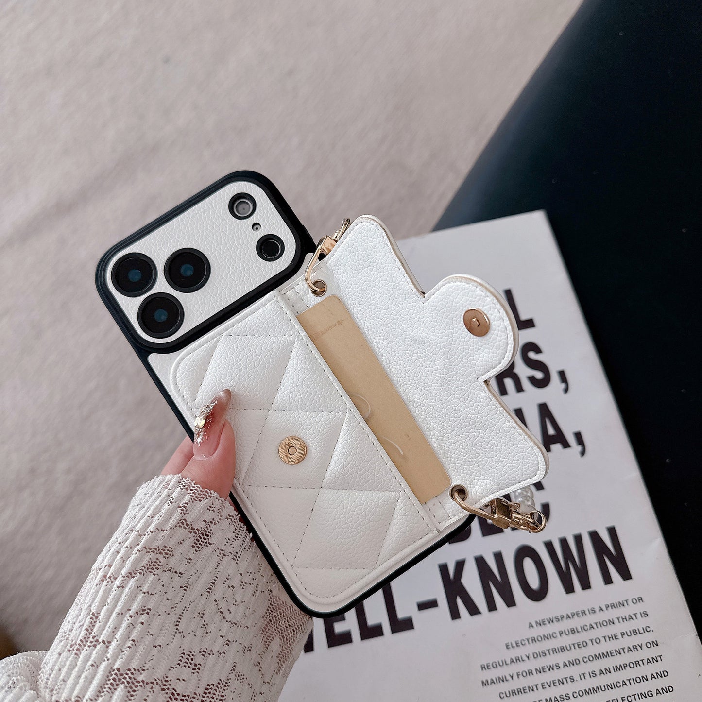 The Oblique Cross Card Holder Lanyard IPhone Case Exudes a High-End Feel, Featuring a Delicate Small Hole Design and Comprehensive Drop Protection.