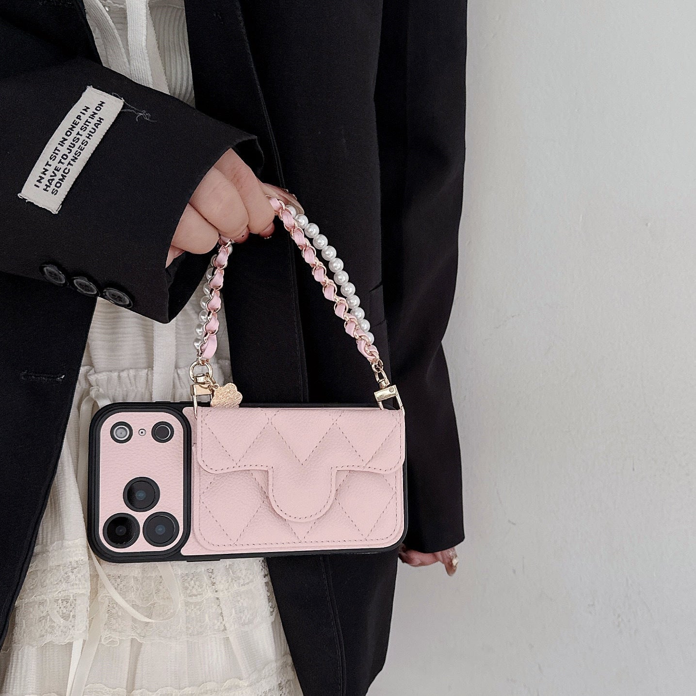 The Oblique Cross Card Holder Lanyard IPhone Case Exudes a High-End Feel, Featuring a Delicate Small Hole Design and Comprehensive Drop Protection.